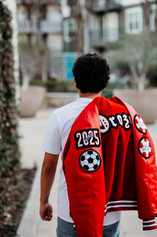Back of a senior letter jacket with class patches