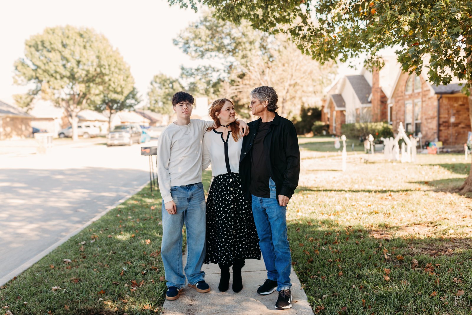 Kelly and her family on their street in Carrollton
