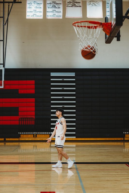 Senior alone on the gym floor