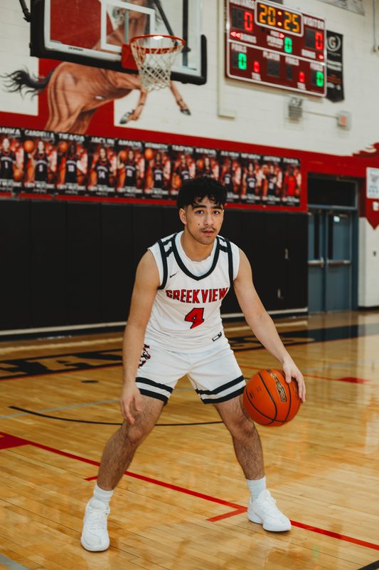 Senior on the court in his jersey