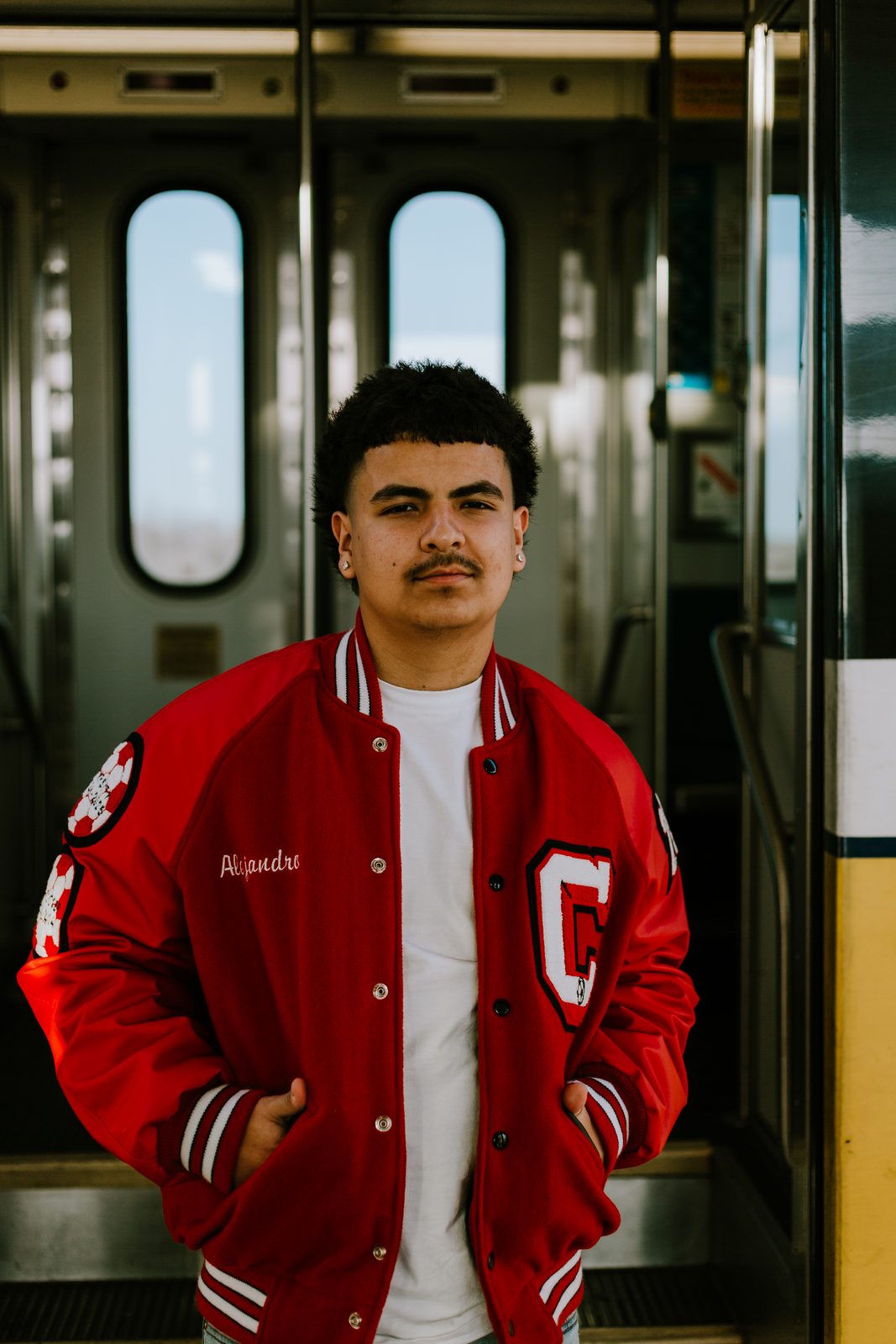 Senior in the doorway of a train