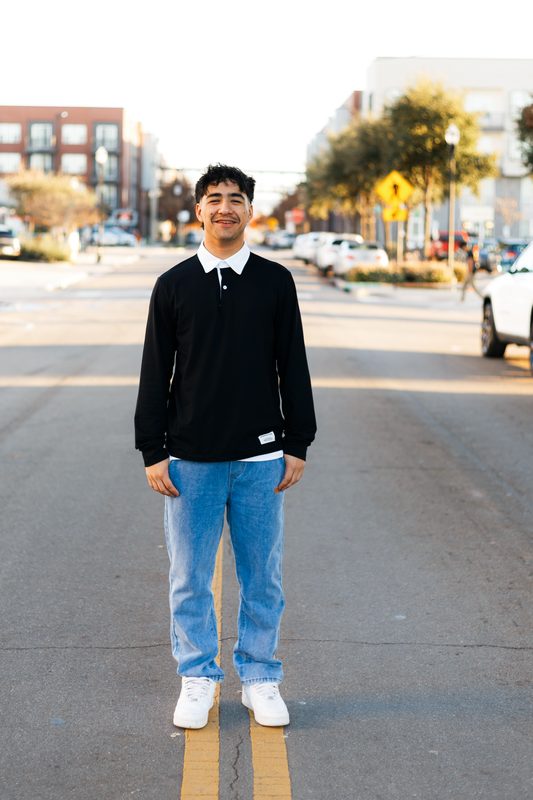 Senior standing in a quiet street