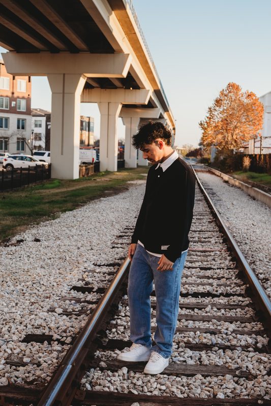 Senior walking the rail lines in Carrollton